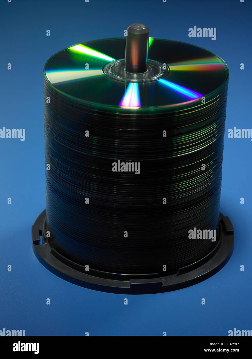 stack of cd or dvd on the blue background Stock Photo
