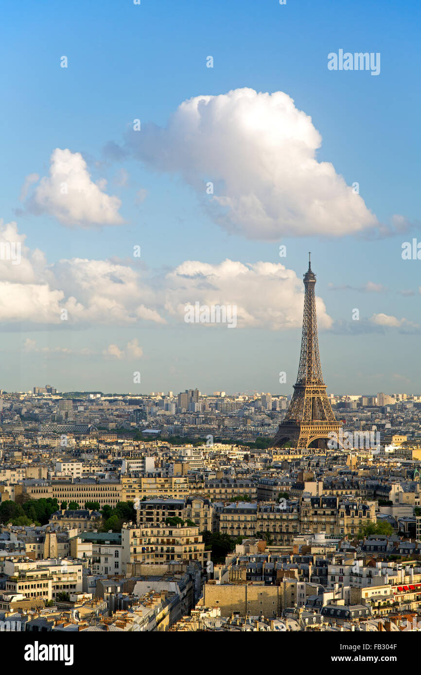 Elevated view of Eiffel Tower, sunny city skyline and distant La Defence skyscraper, Paris, France, Europe Stock Photo