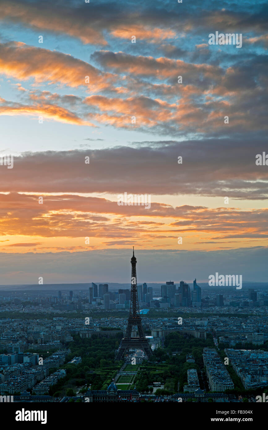 Elevated view of the Eiffel Tower, city skyline and La Defence skyscraper district in the distance, Paris, France, Europe Stock Photo