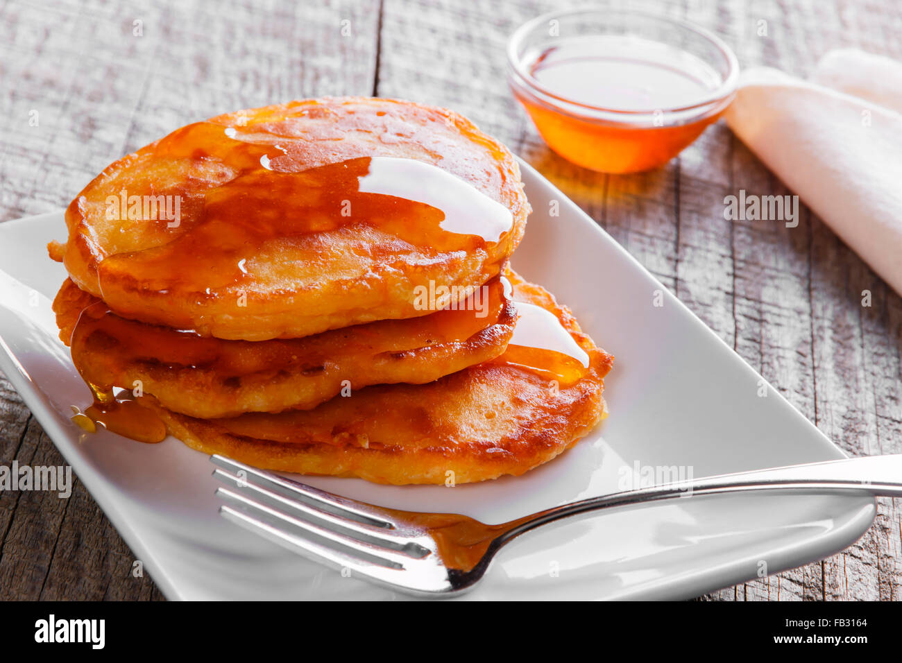pancakes fritters carrot with maple syrup breakfast Stock Photo Alamy