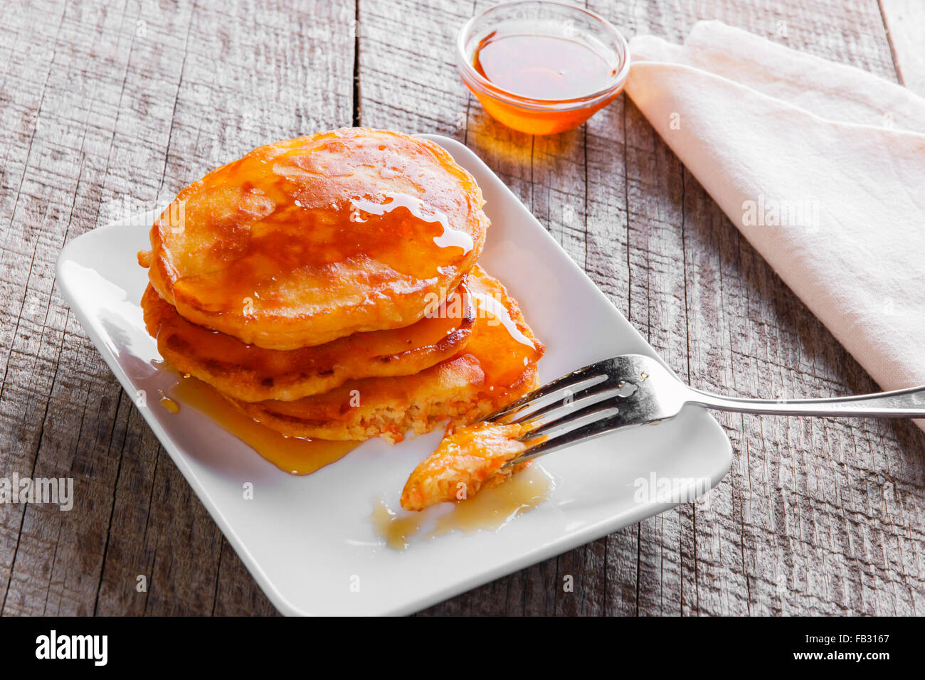 pancakes fritters carrot with maple syrup breakfast Stock Photo Alamy