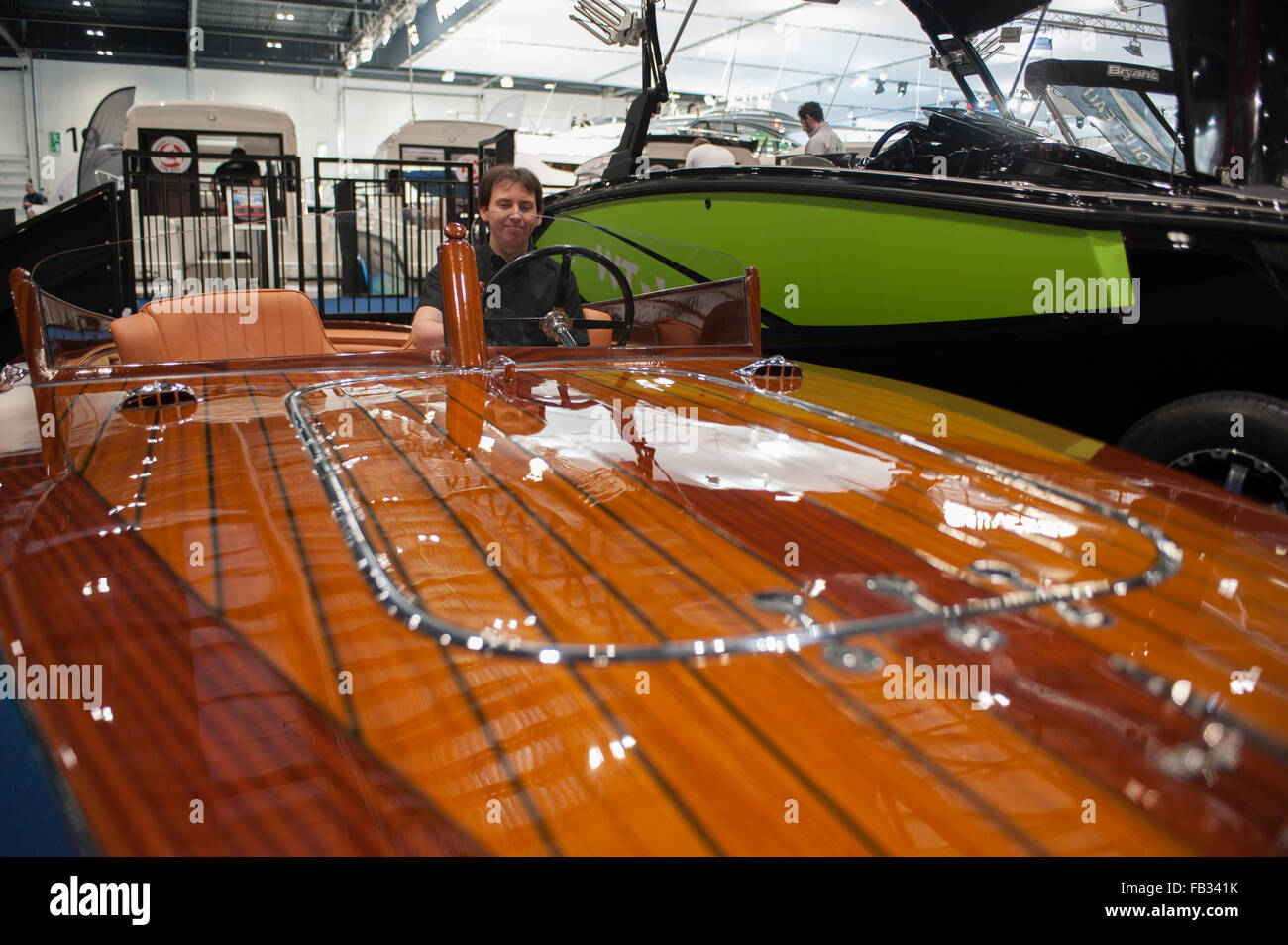 Excel, London, UK. 8th January, 2016. The new Super Launch from Fine Wooden Boats is introduced for the first time at the Boat Show. Handcrafted in Great Britain and protected by 25 coats of varnish, the Super Launch is brought to the show by Tom Neale - the man who restored the star of Boat Show 2014, a 1964 Riva Ariston.. Credit:  Malcolm Park editorial/Alamy Live News Stock Photo