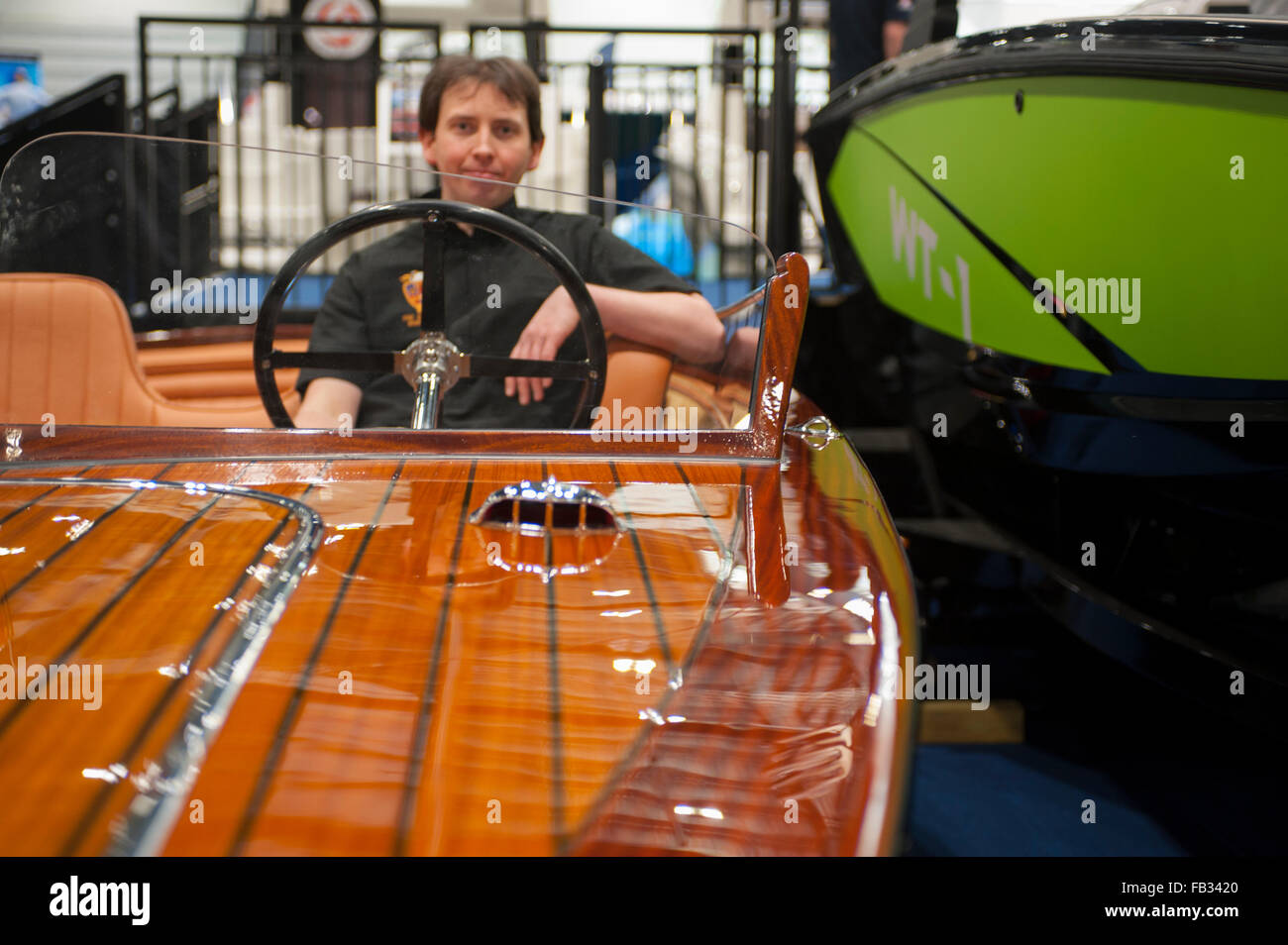 Excel, London, UK. 8th January, 2016. The new Super Launch from Fine Wooden Boats is introduced for the first time at the Boat Show. Handcrafted in Great Britain and protected by 25 coats of varnish, the Super Launch is brought to the show by Tom Neale - the man who restored the star of Boat Show 2014, a 1964 Riva Ariston.. Credit:  Malcolm Park editorial/Alamy Live News Stock Photo