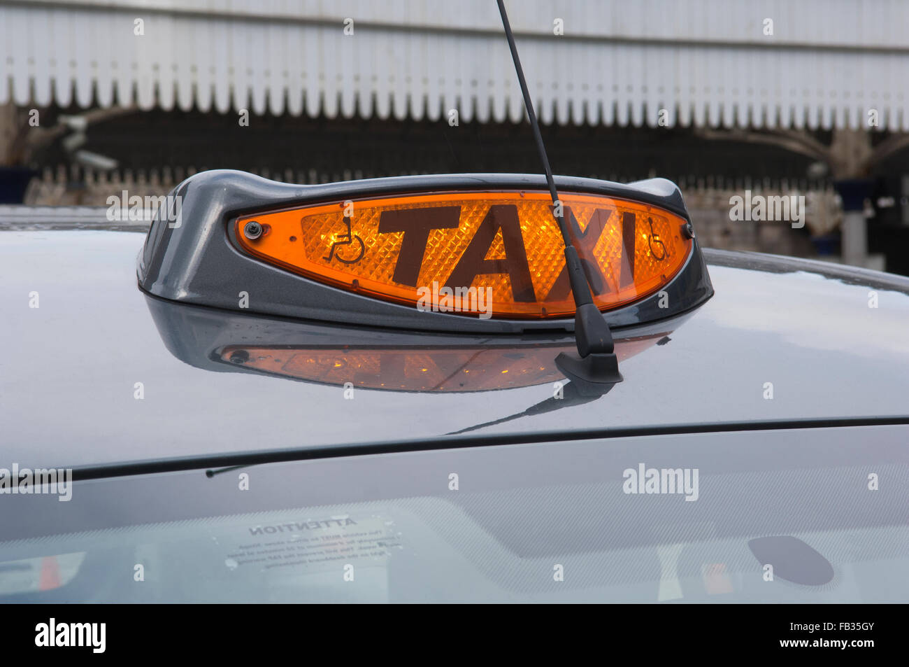 Close up of sign on top of a Taxi - Aberdeen, Scotland. Stock Photo