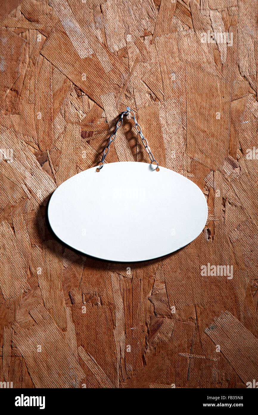 metal signage with string on the texture wood Stock Photo - Alamy