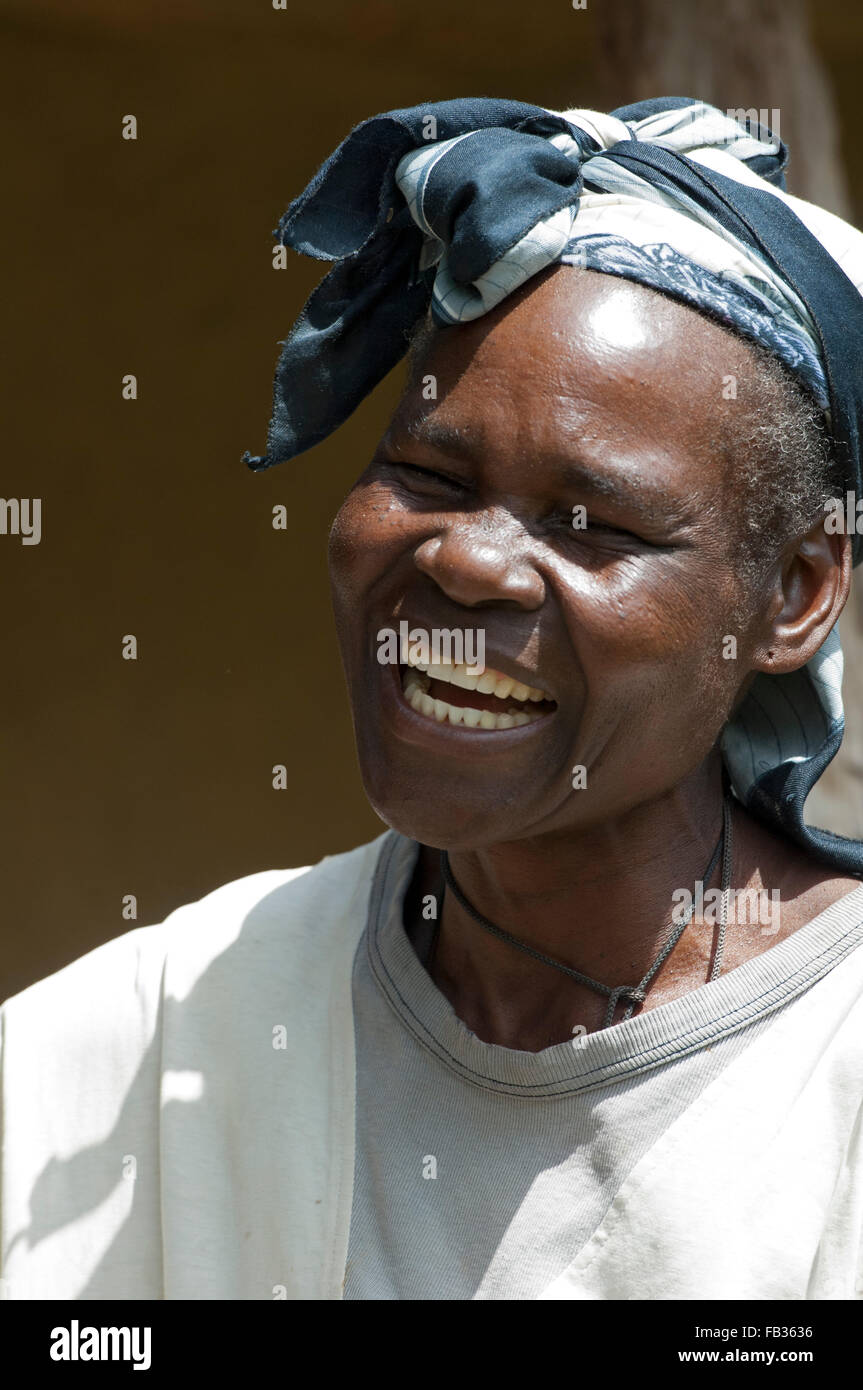 Happy smiling Kenyan woman with a headscarf on. Kenya. Stock Photo