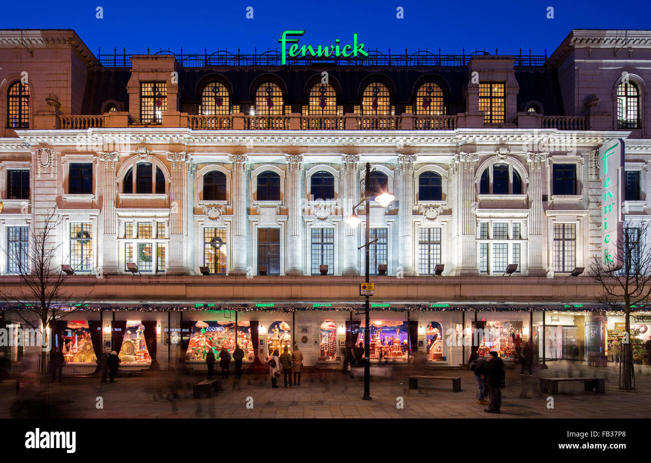 A view at dusk of the Christmas window display in Fenwick Ltd on Northumberland Street in Newcastle upon Tyne Stock Photo