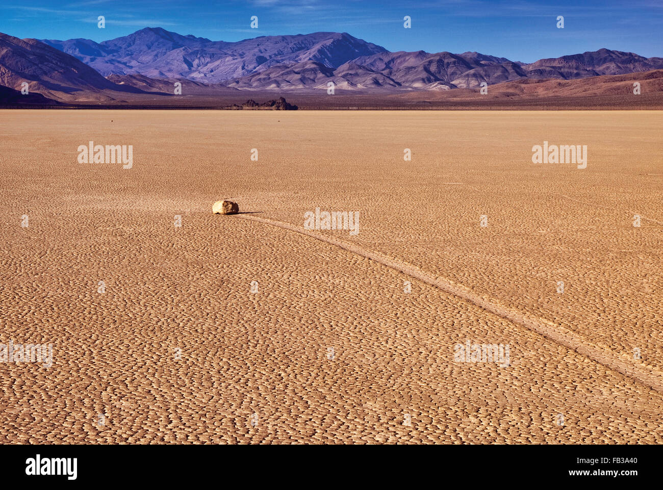 Moving rocks at The Racetrack dry lake, Mojave Desert in Death Valley