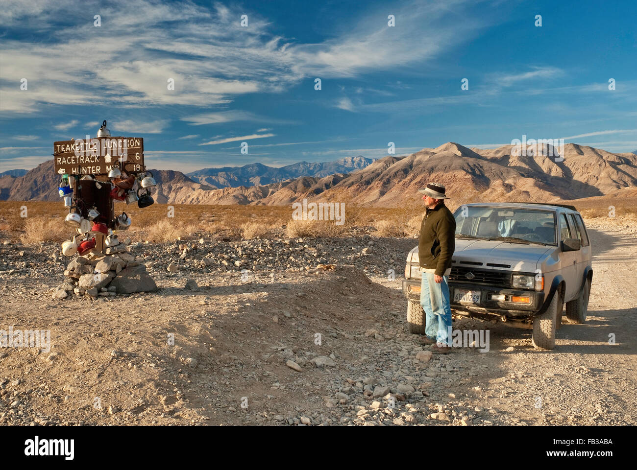 Traveler at Teakettle Junction on Racetrack Valley Road, Mojave Desert in Death Valley National