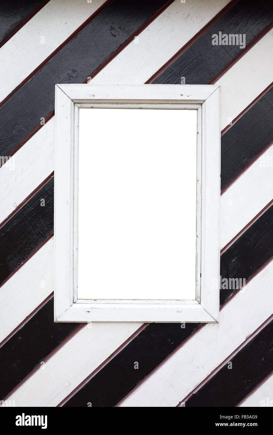 Empty window in wooden wall with black and white diagonal striped pattern Stock Photo