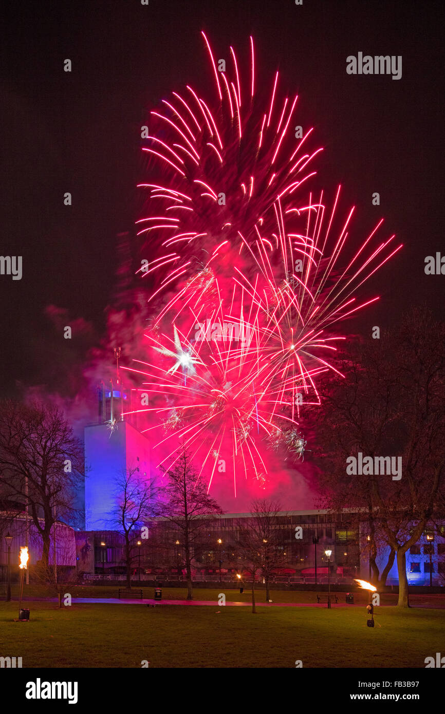 A view of Newcastle Civic Centre in Newcastle upon Tyne at night on New Year Eve with a firework display Stock Photo