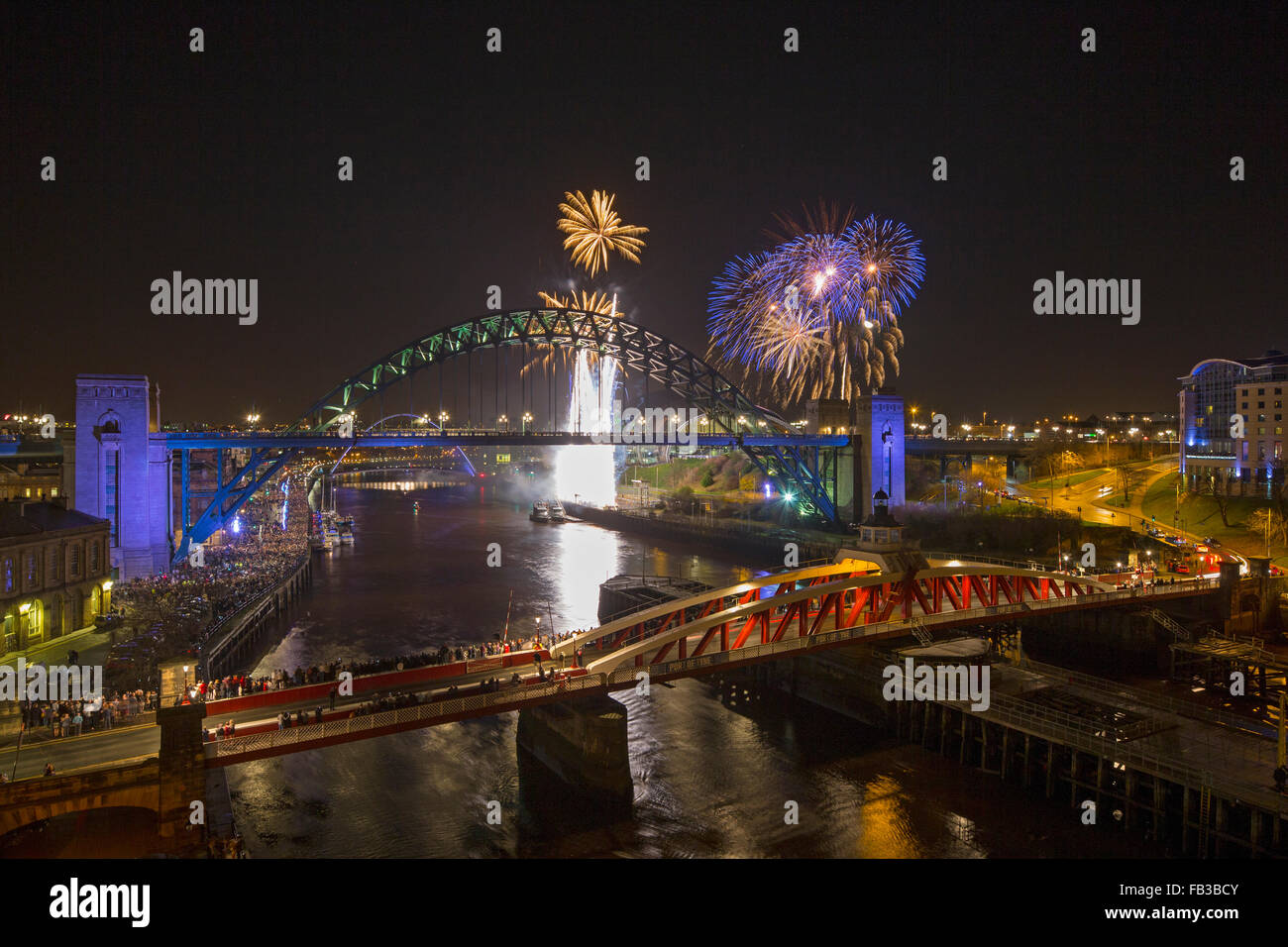 A view of Newcastle and Gateshead quayside at midnight on New Year's Eve with fireworks taken from the High Level Bridge Stock Photo