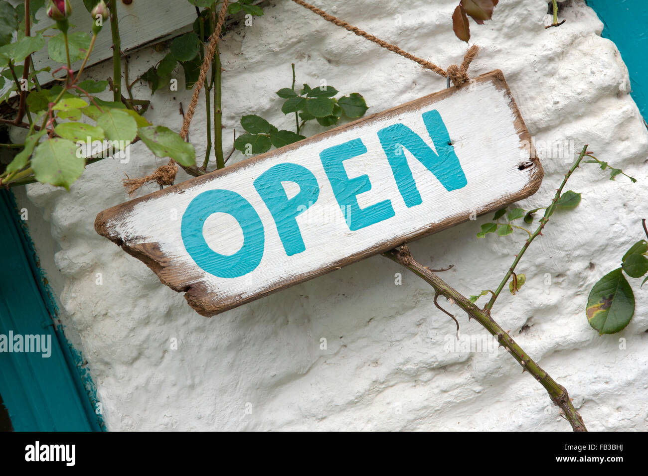 Open Sign on White Stone Background Stock Photo - Alamy