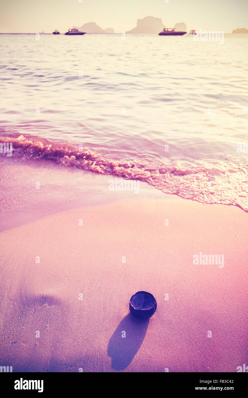 Vintage toned photo of a beach, holidays background. Stock Photo