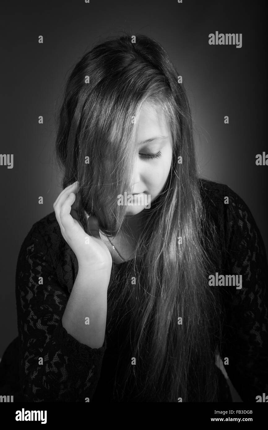 Portrait of a 10 year old girl, studio shot. Stock Photo