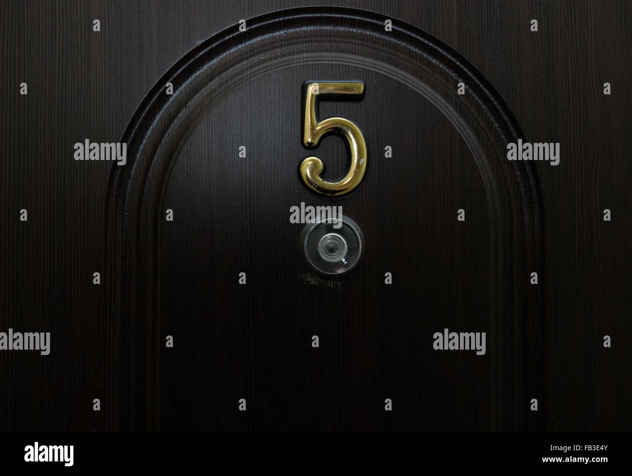 Number five and a peephole Stock Photo