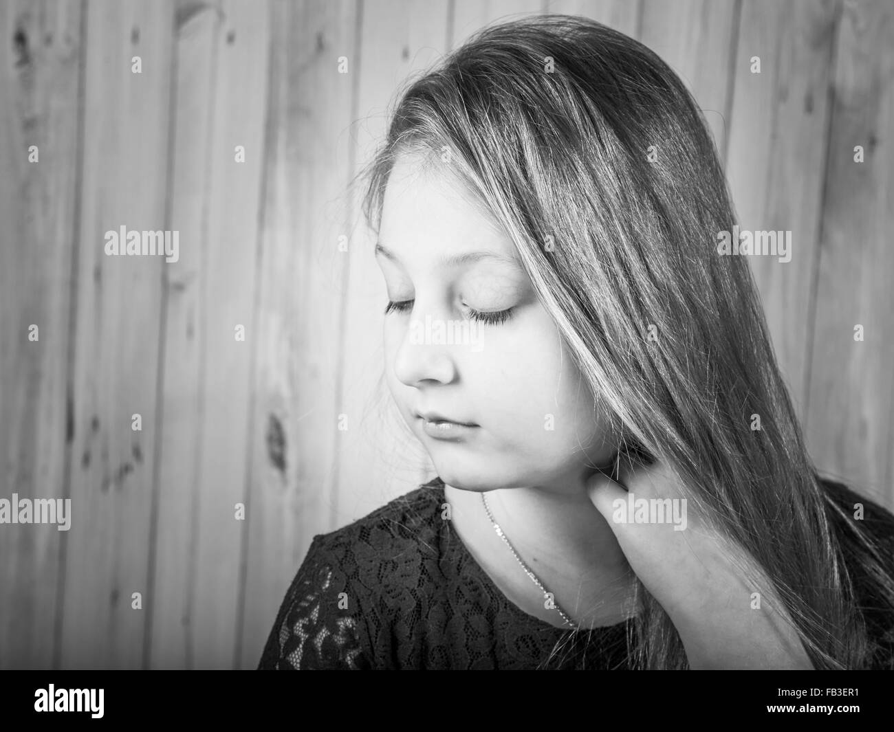 Portrait of a 10 year old girl, studio shot. Stock Photo