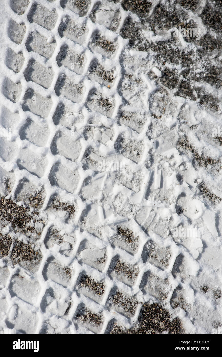 Tire treads on snowy road Stock Photo Alamy