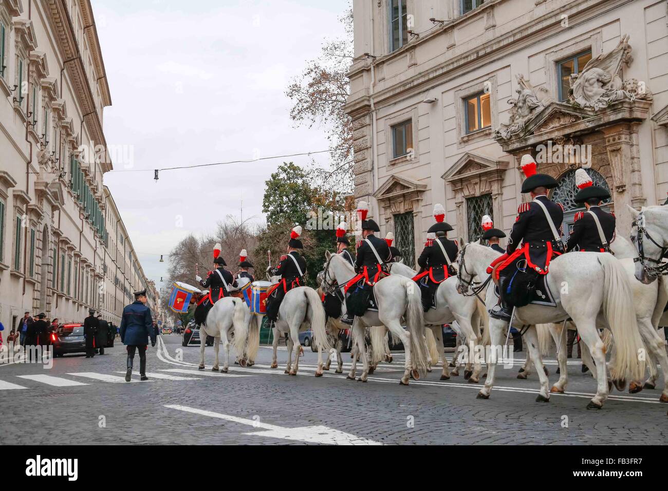Rome, Italy. 07th Jan, 2016. 'Festa del Tricolore' is the officially national day in which the armed forces celebrate the Italian flag. 'Reggimento Corazzieri' and 'Fanfara' of the Carabinieri Cavalry IV Regiment parade in the solemn Changing of the guard at Quirinal square. © Davide Fracassi/Pacific Press/Alamy Live News Stock Photo