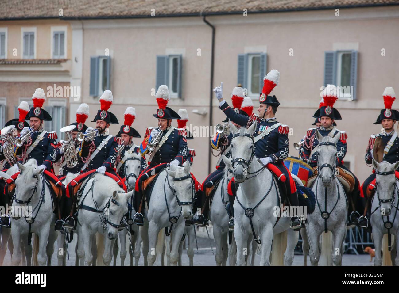 Rome, Italy. 07th Jan, 2016. 'Festa del Tricolore' is the officially national day in which the armed forces celebrate the Italian flag. 'Reggimento Corazzieri' and 'Fanfara' of the Carabinieri Cavalry IV Regiment parade in the solemn Changing of the guard at Quirinal square. © Davide Fracassi/Pacific Press/Alamy Live News Stock Photo