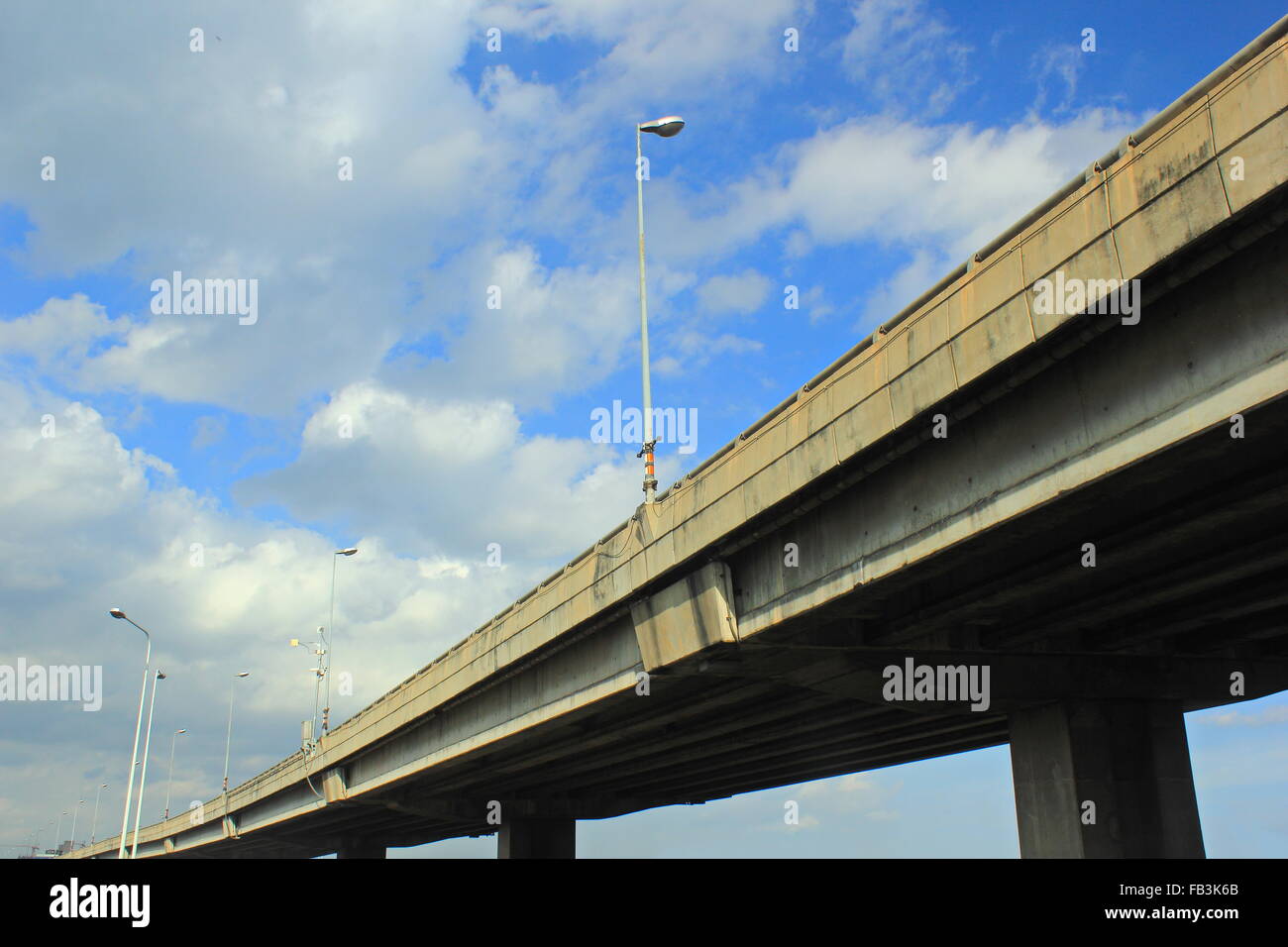 background of elevated bridge with street light during the evening hours Stock Photo