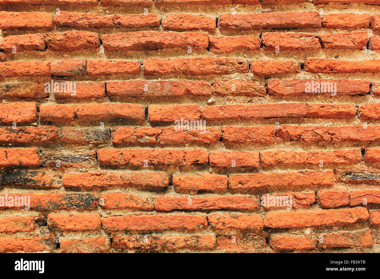 background and pattern of deteriorated brick wall Stock Photo