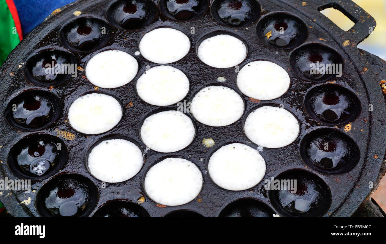 Sweet and Savory Grilled Coconut-Rice Hotcakes, Coconut Rice Cake, Asian dessert, Thai, Thailand, Luang Prabang, Laos Stock Photo