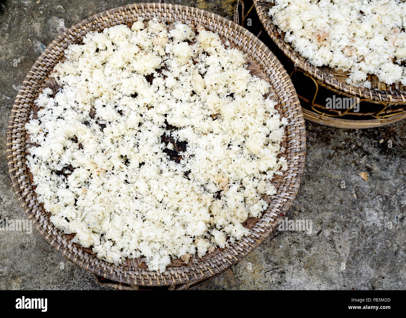Dry Sticky Rice in the basket traditional in Luang Prabang, Laos Stock Photo