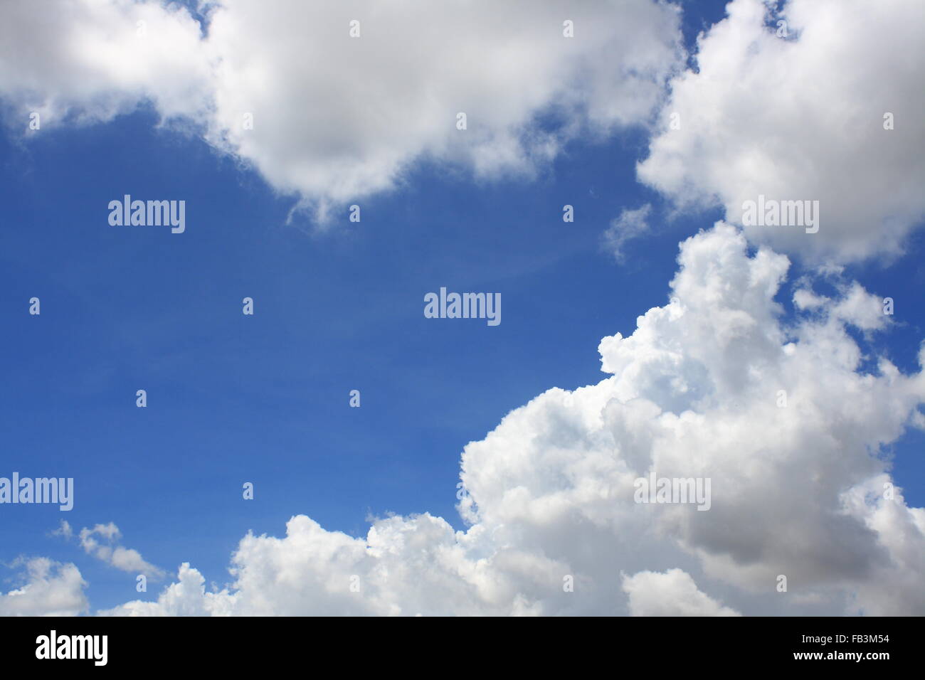 abstract nature background of blue sky and fluffy white cloud during ...