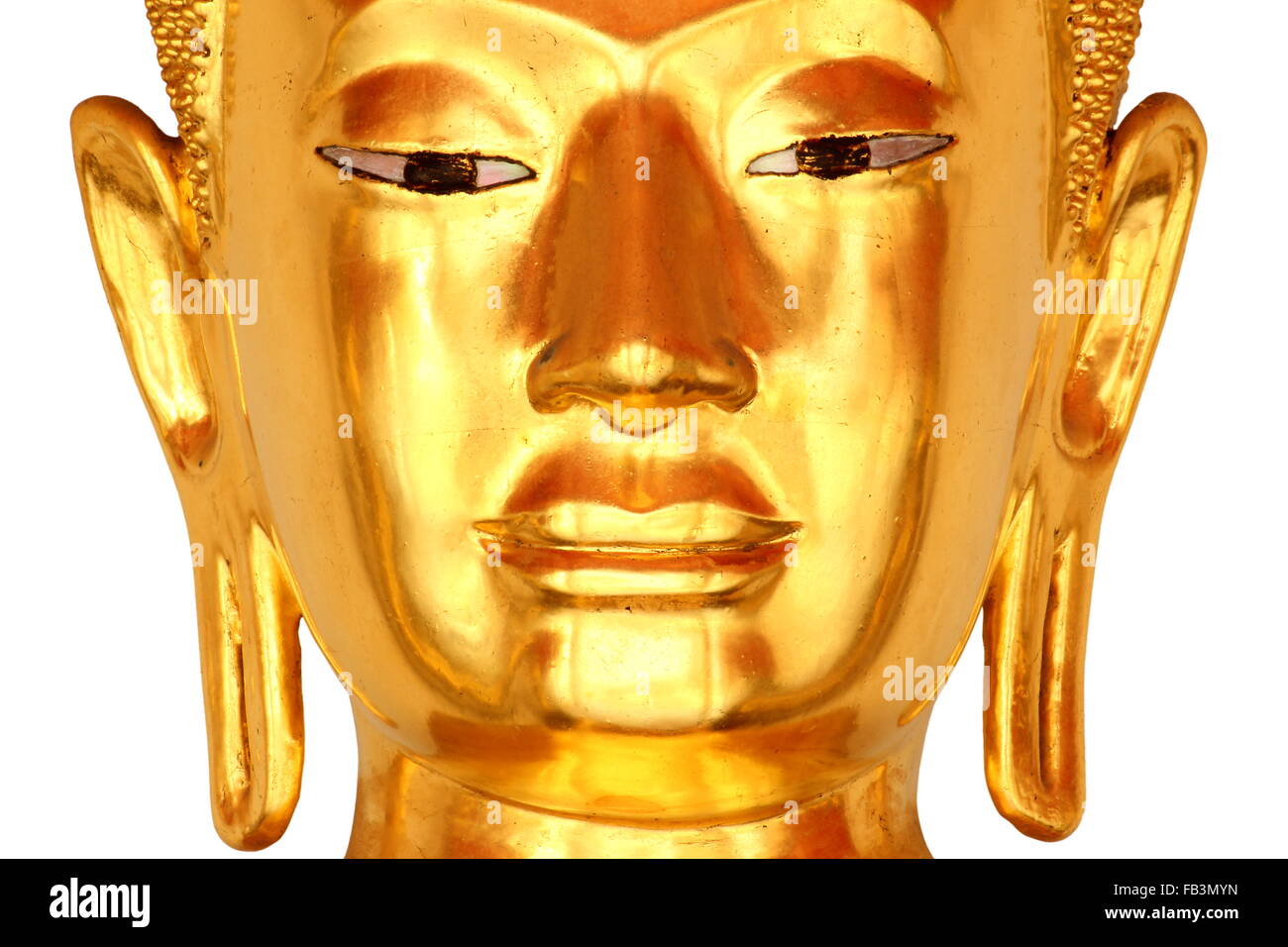 golden buddha face statue in buddhist temple isolated on white background Stock Photo