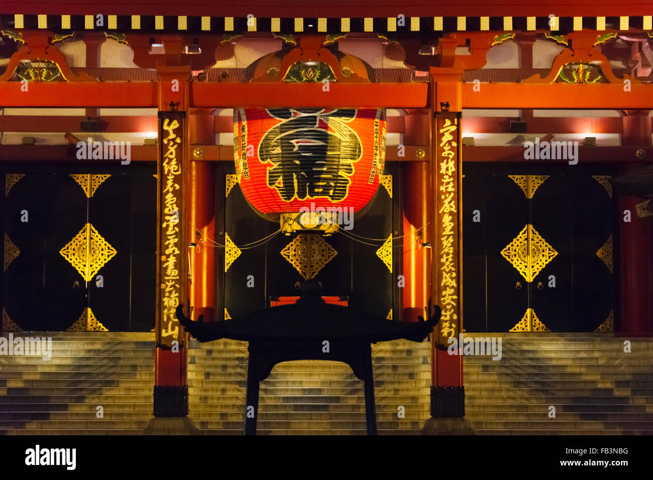 Red lantern and incense burner at Kaminari Gate at the entrance gate leading to Sensoji Temple, Asakusa, Tokyo, Japan Stock Photo
