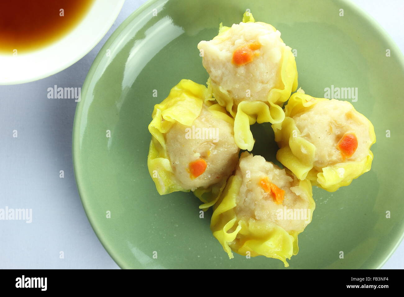 shumai , siu mai chinese steamed pork dumplings with sauce Stock