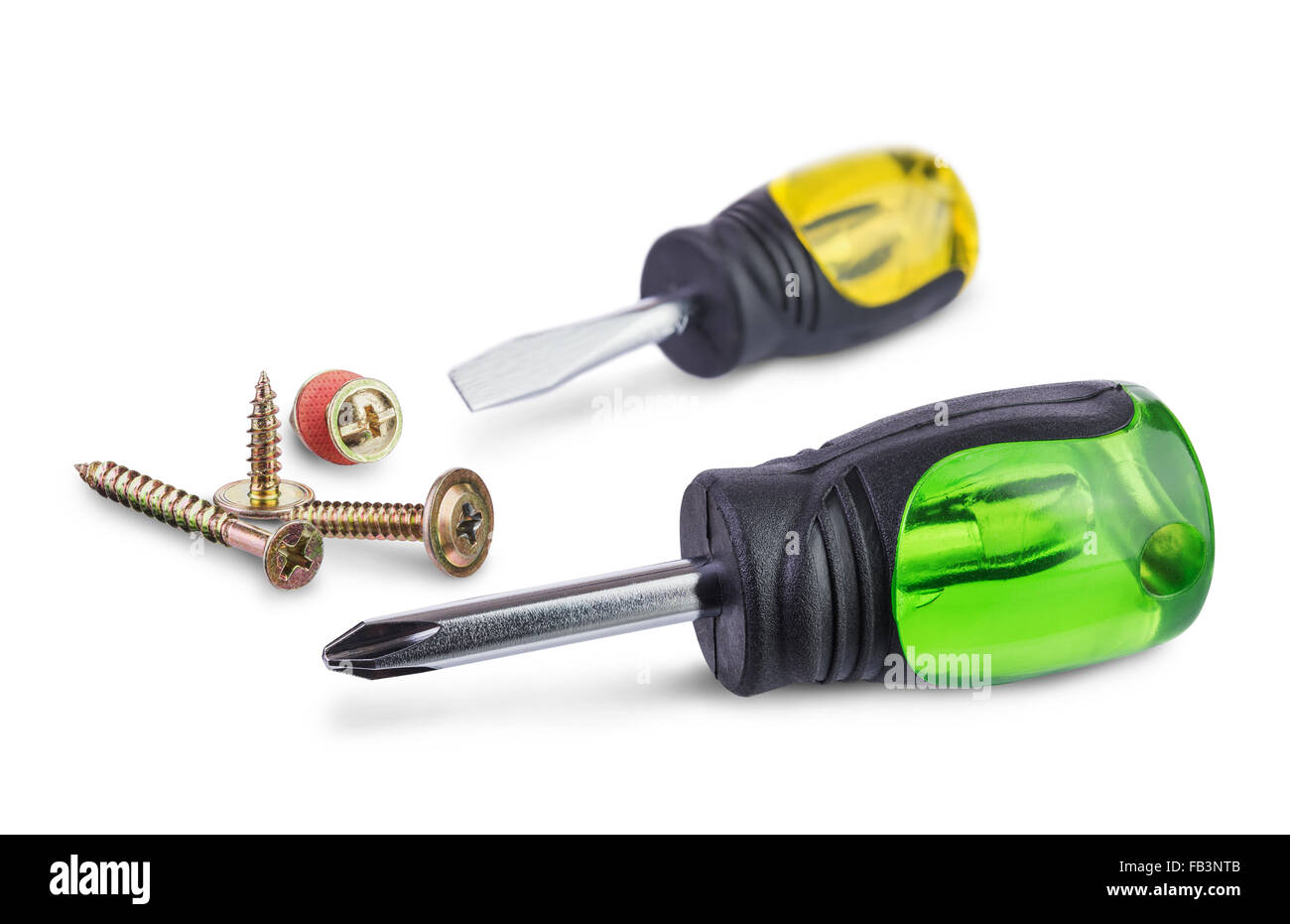 multicolored  short screwdrivers and different screws isolated on white Stock Photo