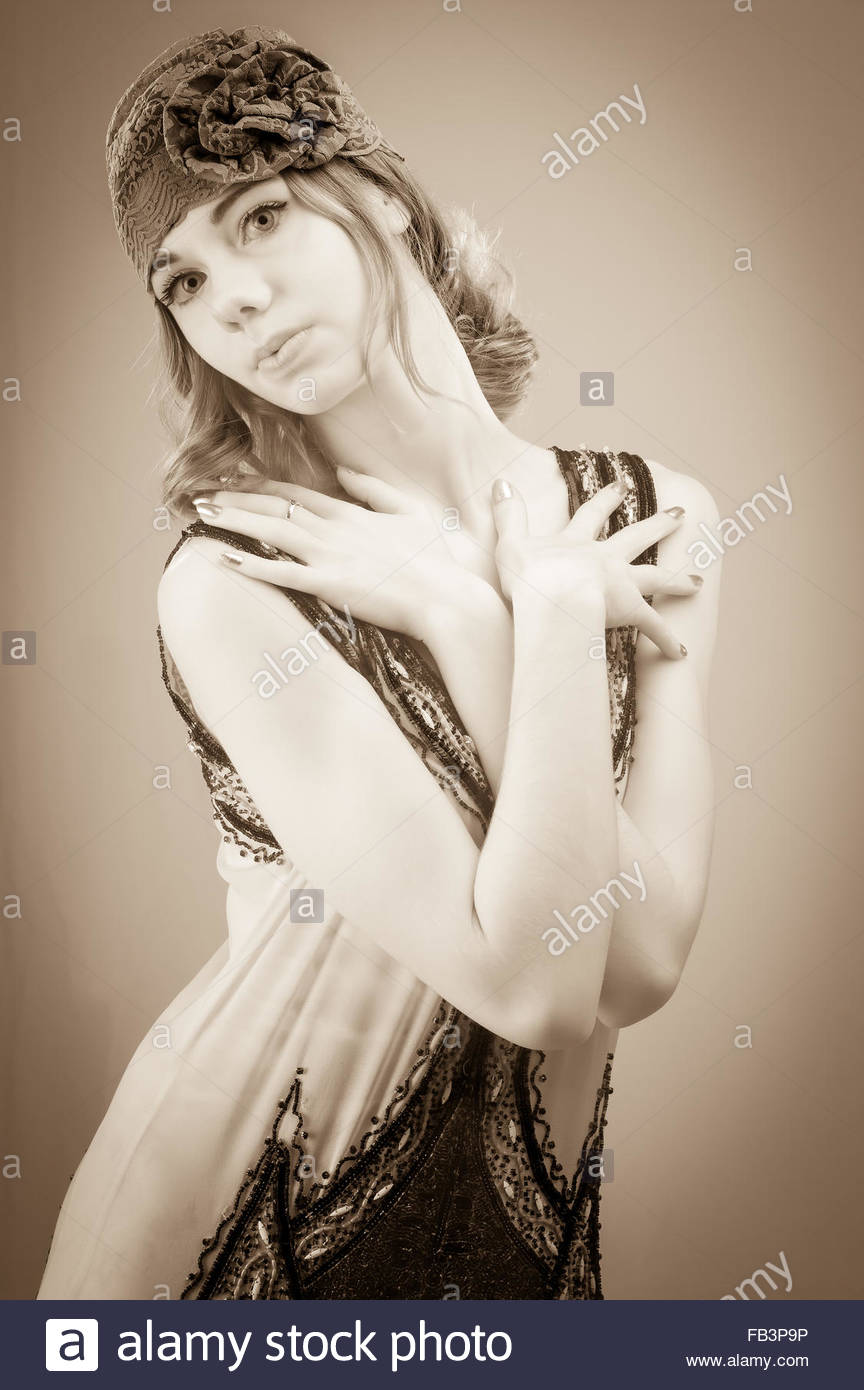 Portrait Of A Young Woman In A 1920 S Style Vintage Hat And