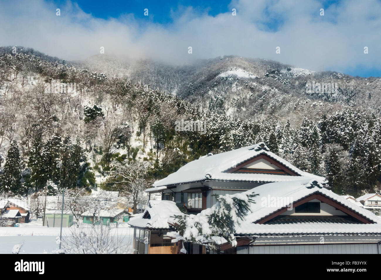 Houses in the mountain covered with snow, Gifu Prefecture, Japan Stock Photo