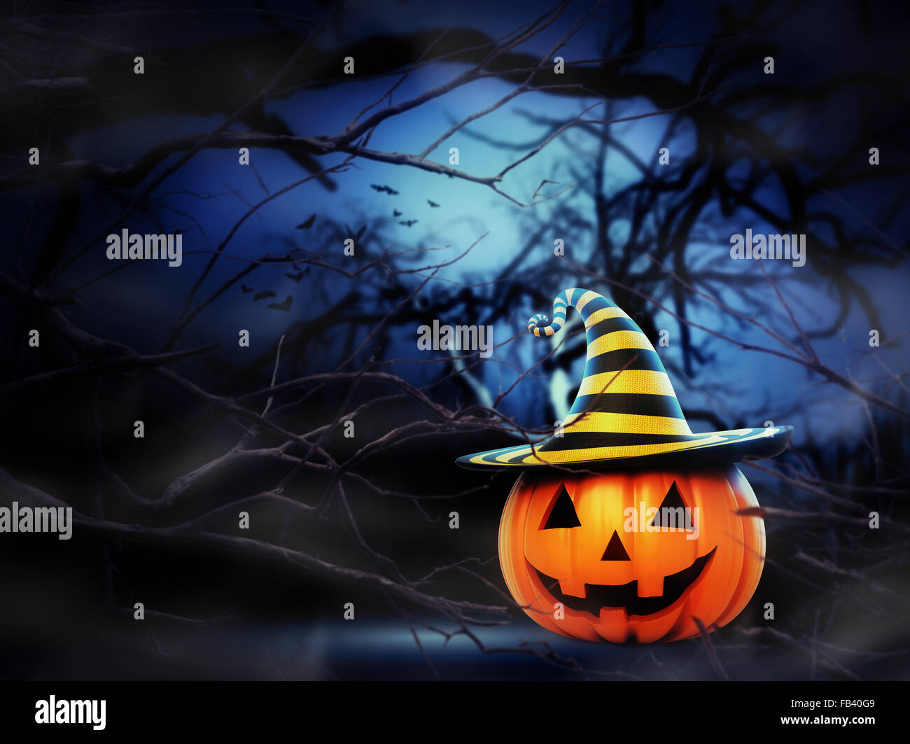 Helloween pumpkin in the forest Stock Photo - Alamy