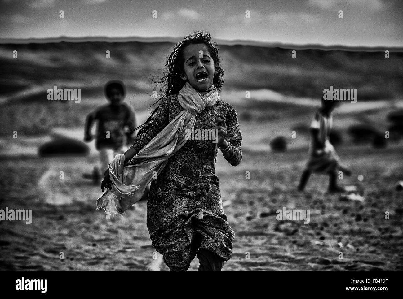 Bedouin children in Wahiba Sands, Al Sharqiya, black and white, Oman Stock Photo