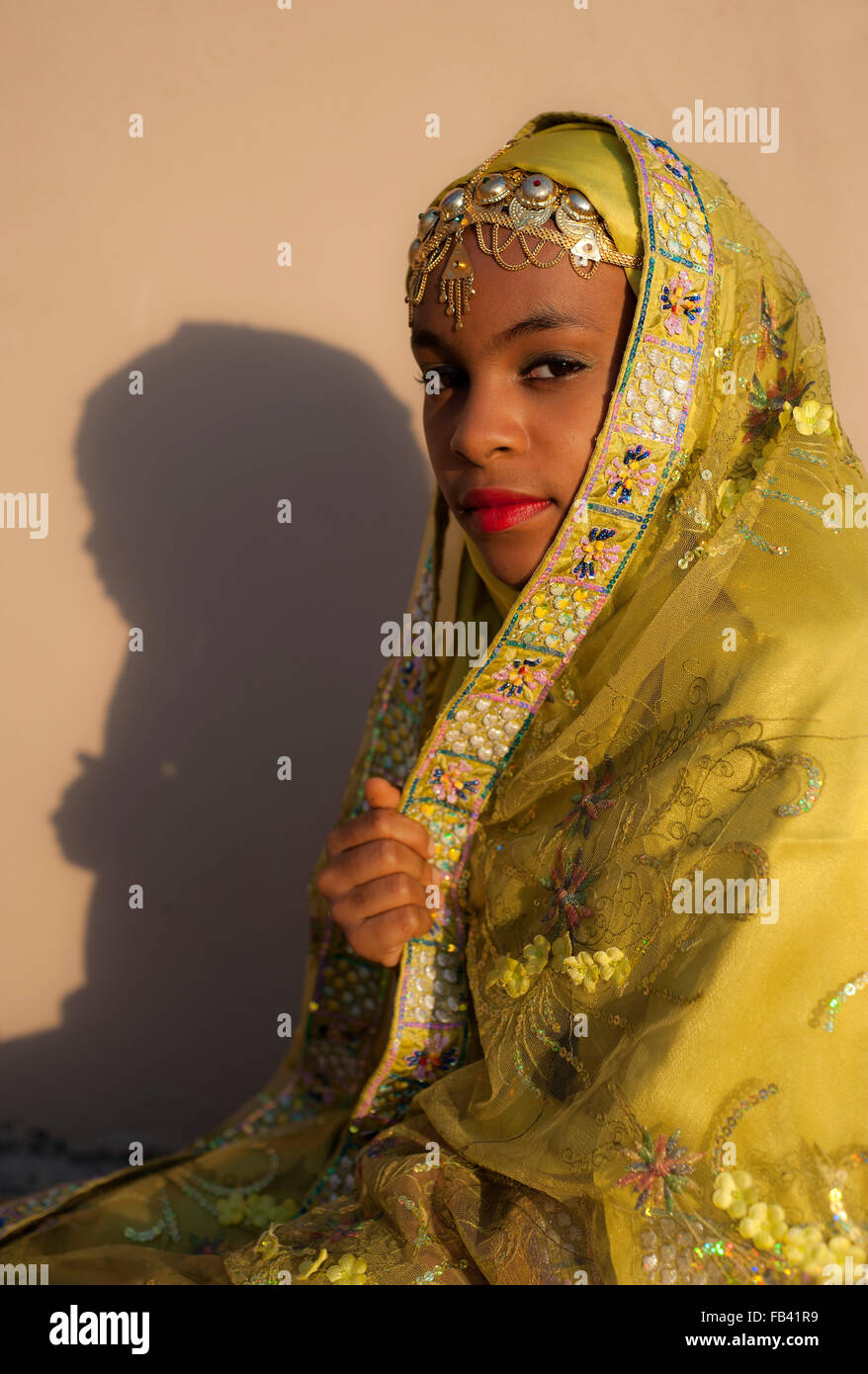 Young girl in traditional costume, Oman Stock Photo