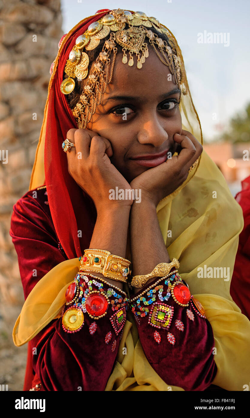 Young girl in traditional costume, Oman Stock Photo