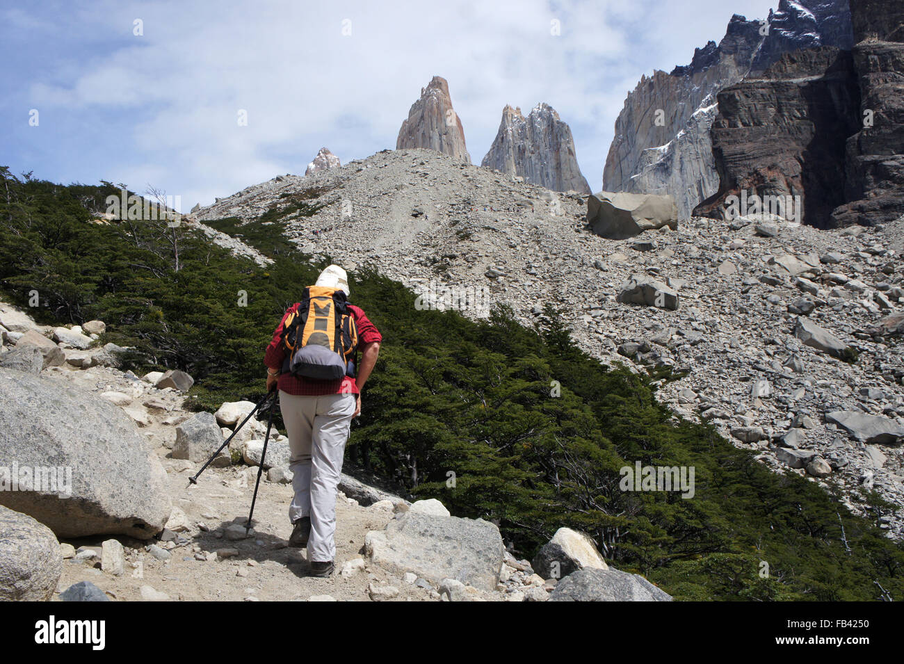 Hiker on trail to Mirador Torres del Paine, Patagonia, Chile Stock Photo