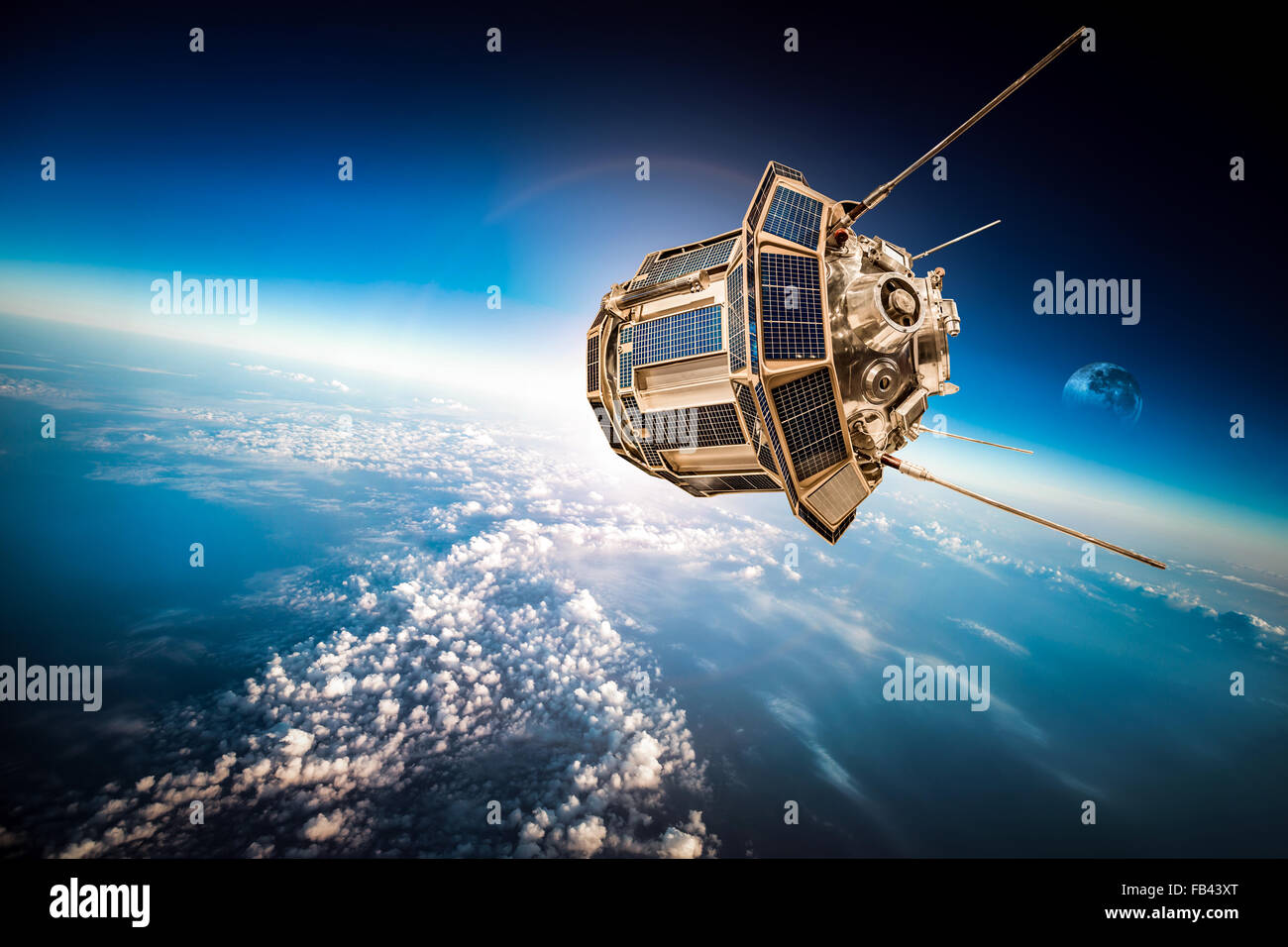 Space satellite orbiting the earth. Elements of this image furnished by NASA. Stock Photo