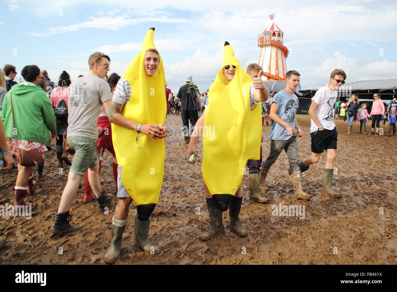 A pair of young men dress as bananas as part of the annual fancy dress event at the Y Not music festival, Derbyshire England UK Stock Photo