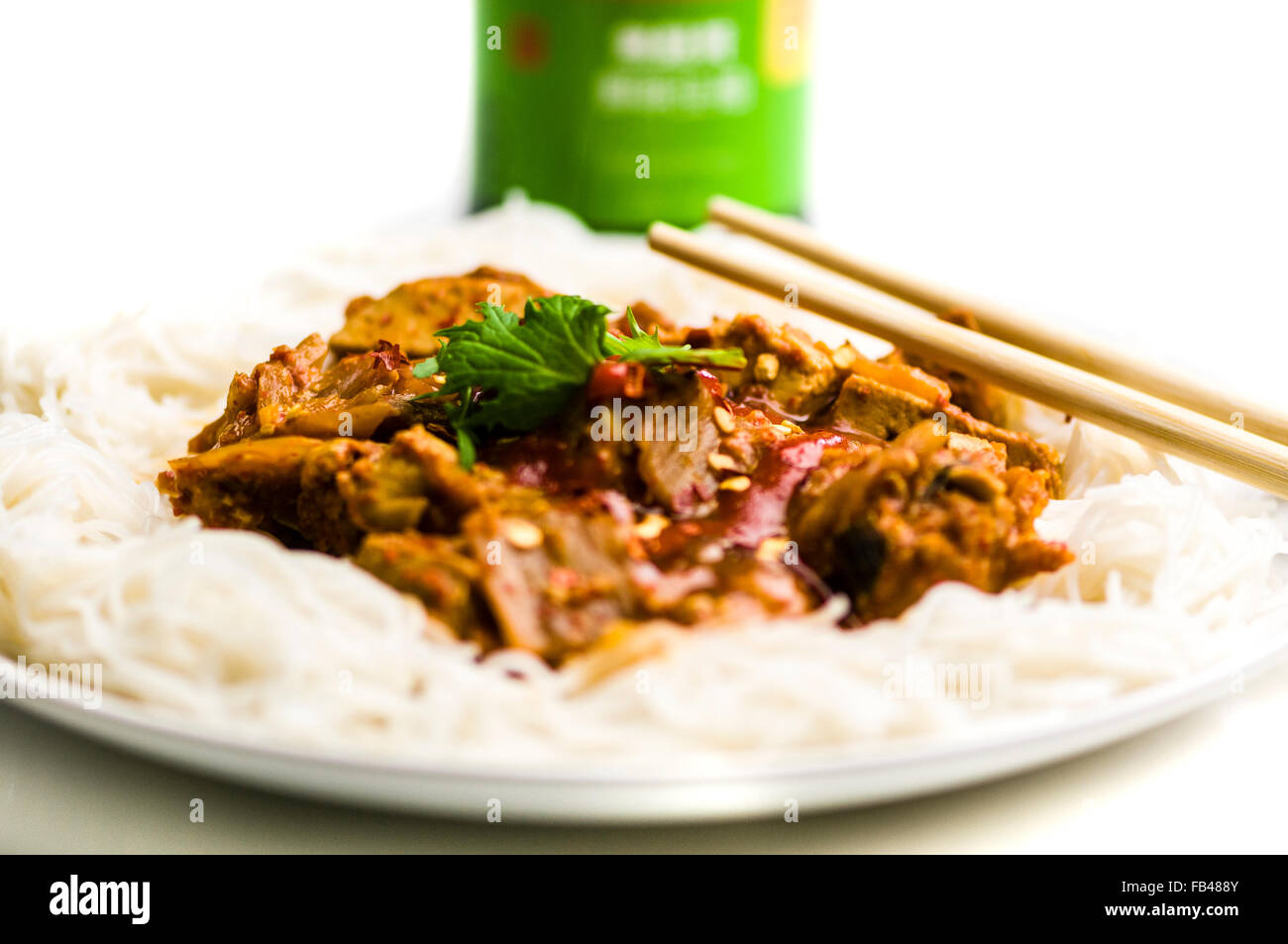 Kimchi stew with tofu and pork, on rice noodles Stock Photo