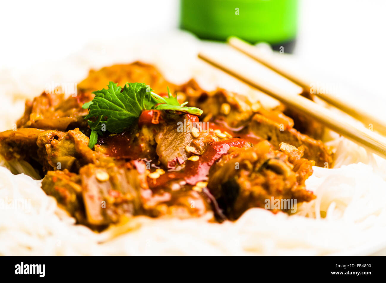 Kimchi stew with tofu and pork, on rice noodles Stock Photo