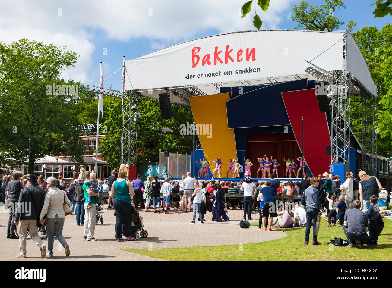 Entertainment on the platform at the amusement park Bakken, Klampenborg, Copenhagen, Denmark Stock Photo