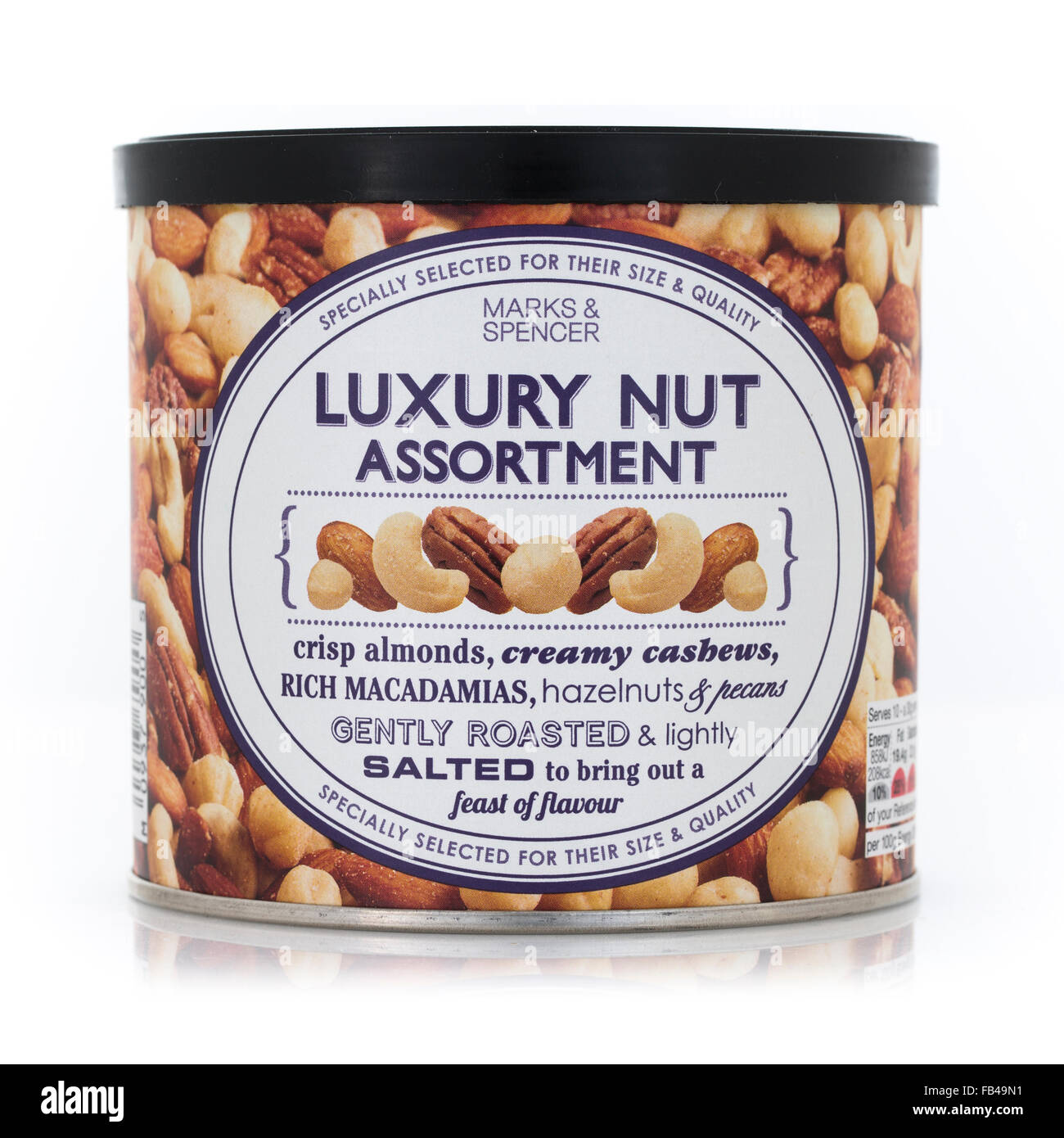 Tin of Marks and Spencer Luxury Nut Assortment on a White Background Stock Photo