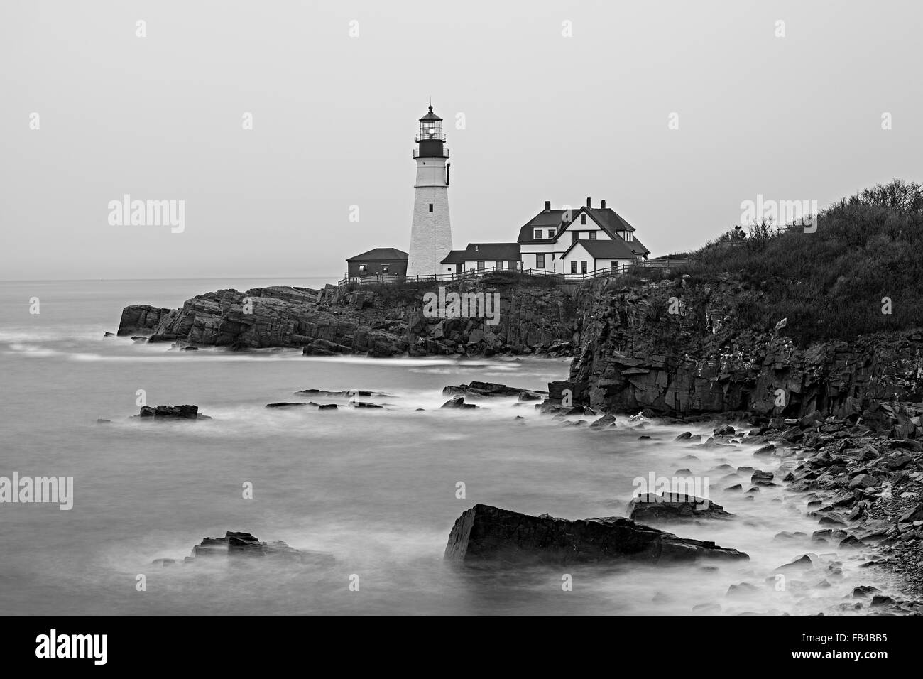 North side of Portland Head lighthouse, Cape Elizabeth, Maine on a foggy morning. Stock Photo