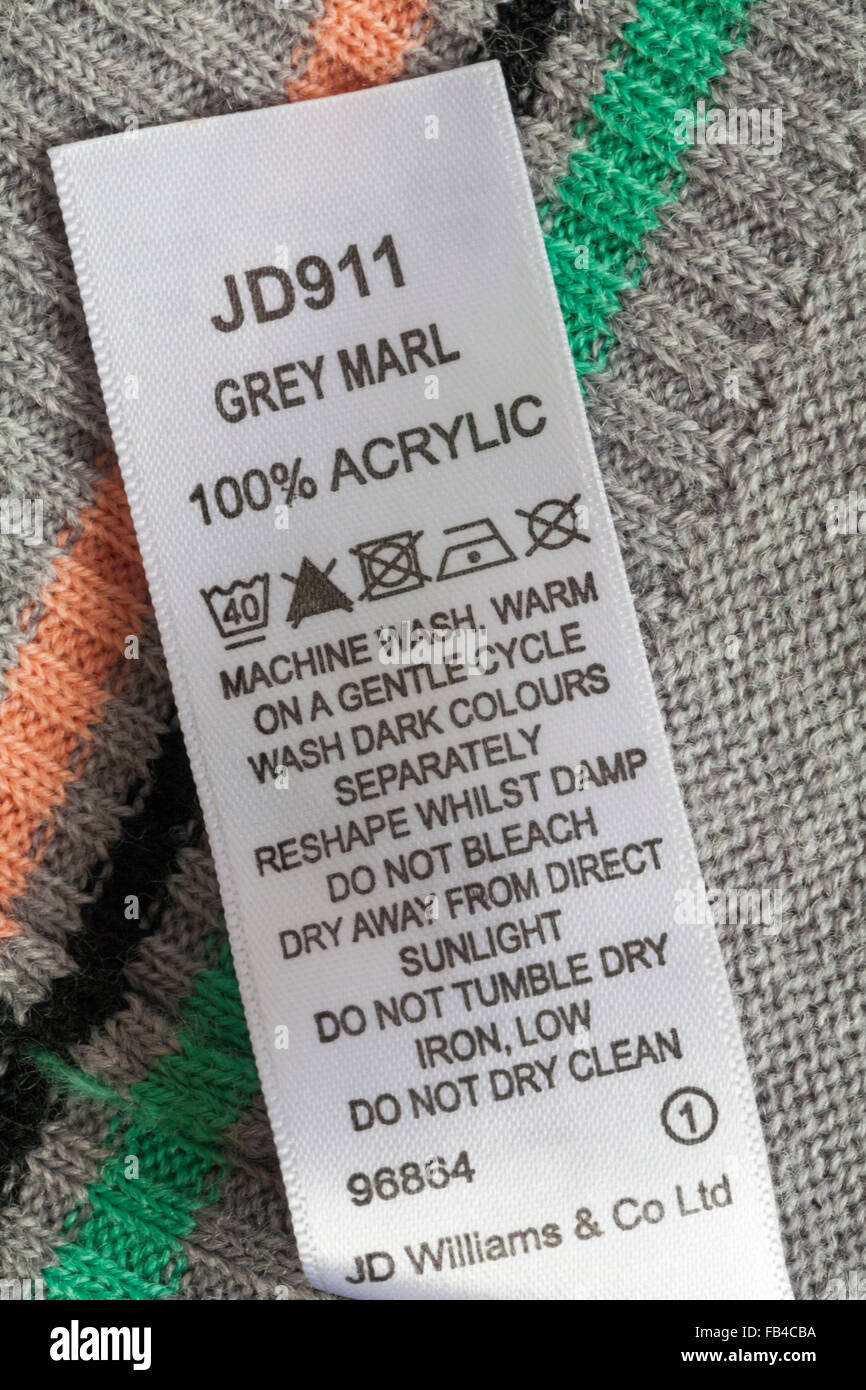 Care instructions in Note 100% acrylic jumper - care washing symbols and instructions Stock Photo