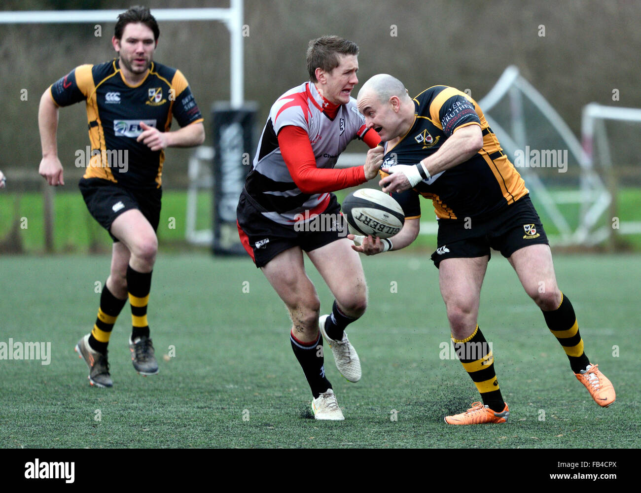 Burnage 9th January 2016  A Burnage player tries to pass the ball in a match in which Burnage Rugby Club were attempting to move from bottom place in the league but were heavily defeated by Ilkley, who were third bottom. Credit:  John Fryer/Alamy Live News Stock Photo
