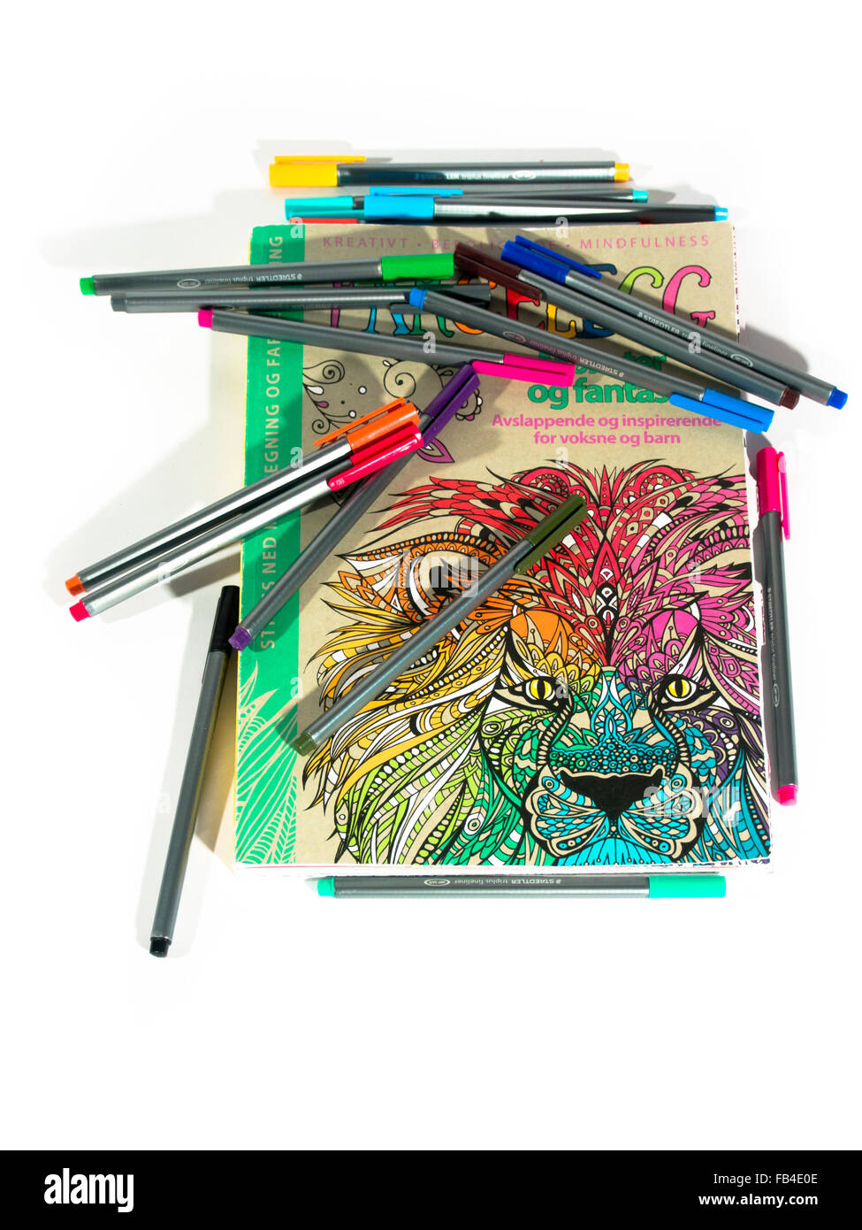 Intricate and colourful drawing for adults has become trendy and is said to relieve stress, catchword mindfulness Stock Photo